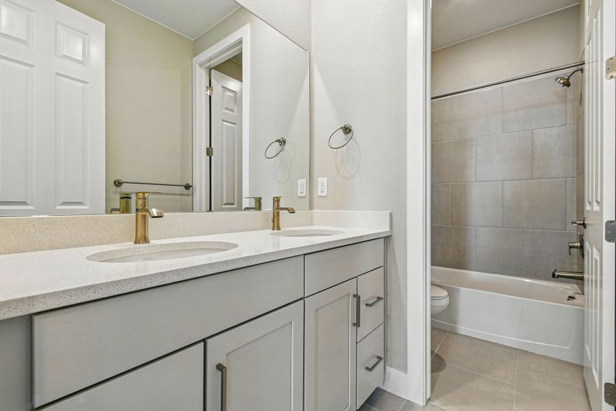 Furnished interior view inside a new home in Trailstone, Arvada (Image 27).