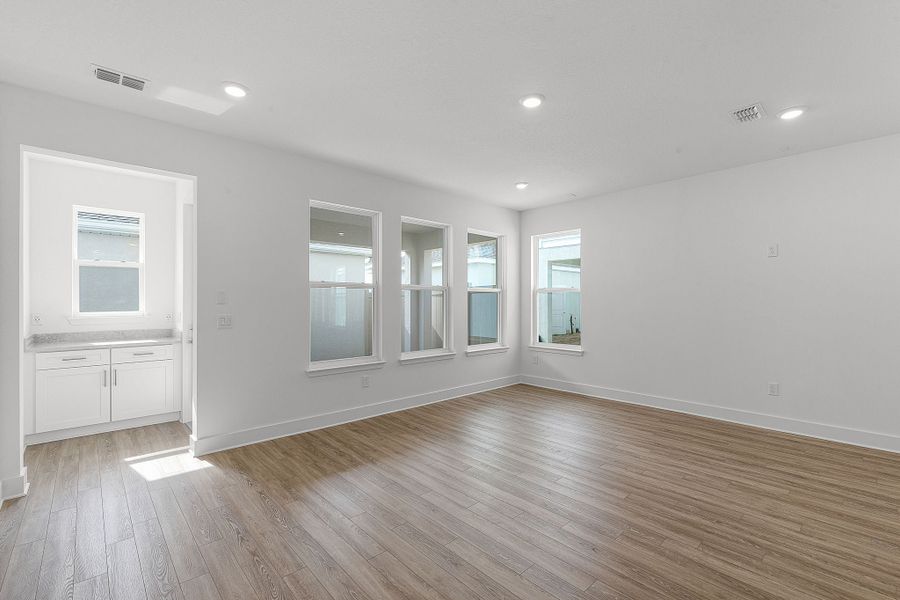 Representative unfurnished interior of a home built from the Franklin by Rockwell Homes in Harvest at Ovation - Townhomes, Winter Garden (Image 26). Representative unfurnished interior of a home built from the Franklin by Rockwell Homes in Harvest at Ovation - Townhomes, Winter Garden (Image 26).