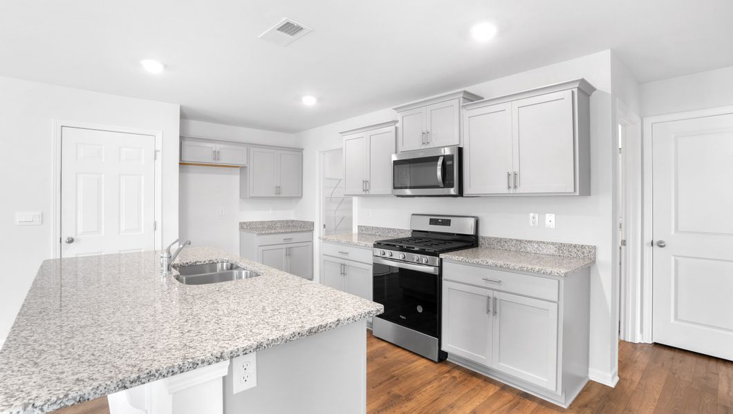 Furnished interior view inside a new home in Harrier Point, Woodruff (Image 7).