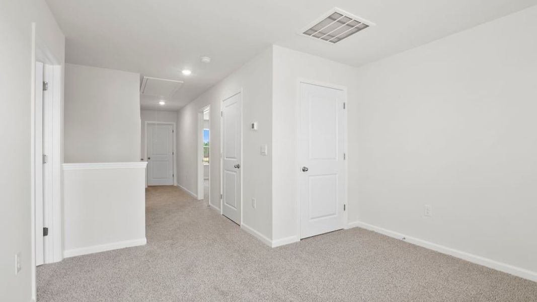 Spacious, unfurnished interior of a new home in Durbin Meadows Traditions, Fountain Inn (Image 25).