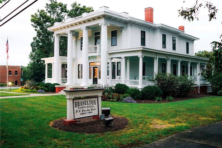 Front exterior of a new home in Rosewood Lake Estates, Hoschton, GA, highlighting curb appeal (Image 41).