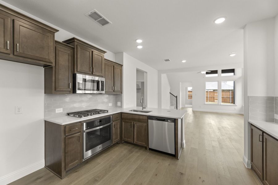 Furnished interior view inside a new home in The Reserve at Spiritas Ranch, Little Elm (Image 7).