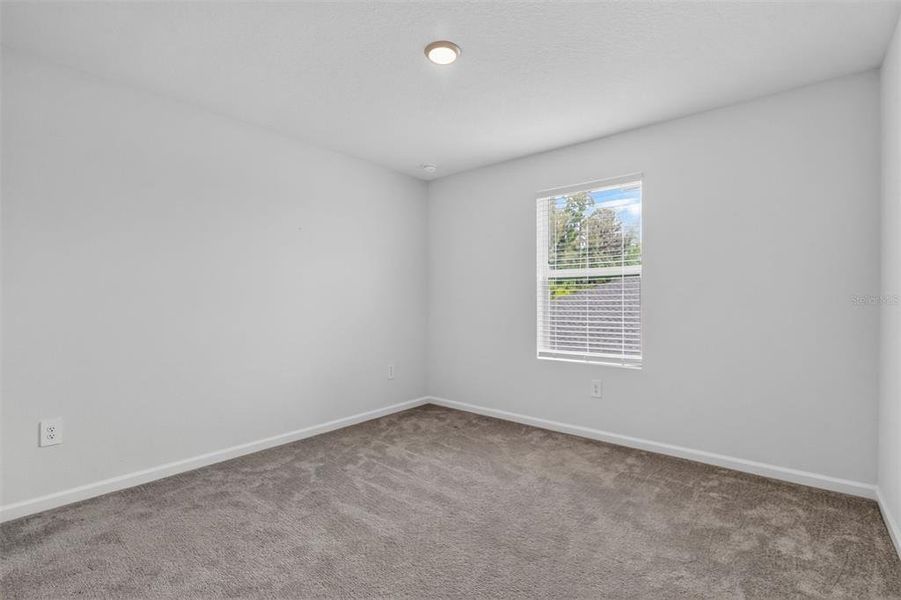 Spacious, unfurnished interior of a new home in Tara Forest East, Alachua (Image 28).