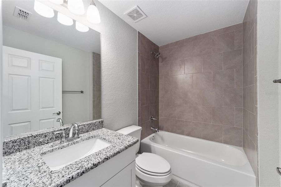 Furnished interior view inside a new home in , Dunnellon (Image 7).