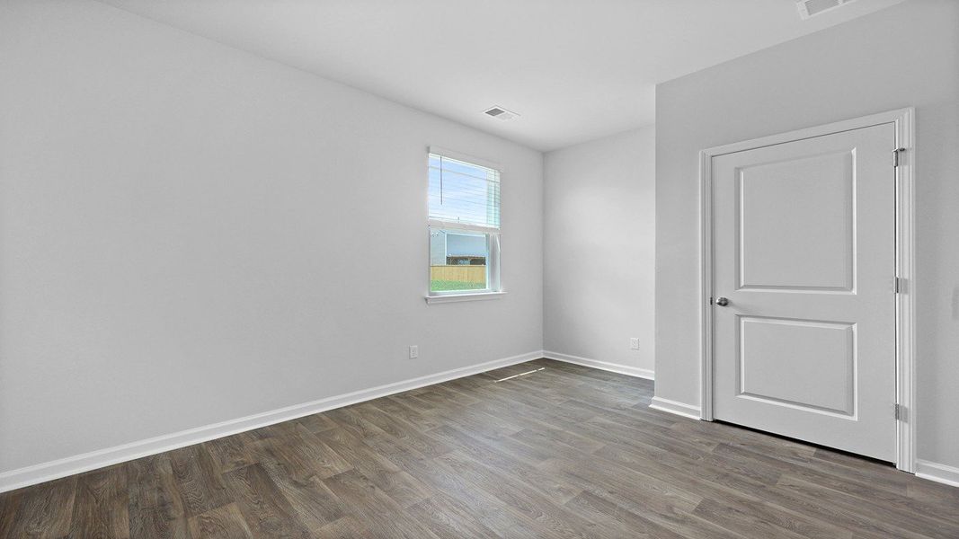 Spacious, unfurnished interior of a new home in Pine Hills at Cane Bay, Summerville (Image 15). Spacious, unfurnished interior of a new home in Pine Hills at Cane Bay, Summerville (Image 15).