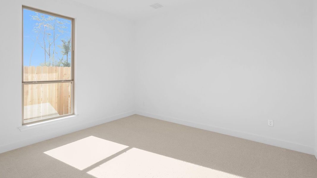 Spacious, unfurnished interior of a new home in Artavia 45', Conroe (Image 13).