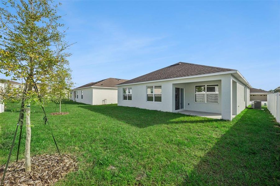 Exterior details and patio area of a home in , Tavares (Image 22).