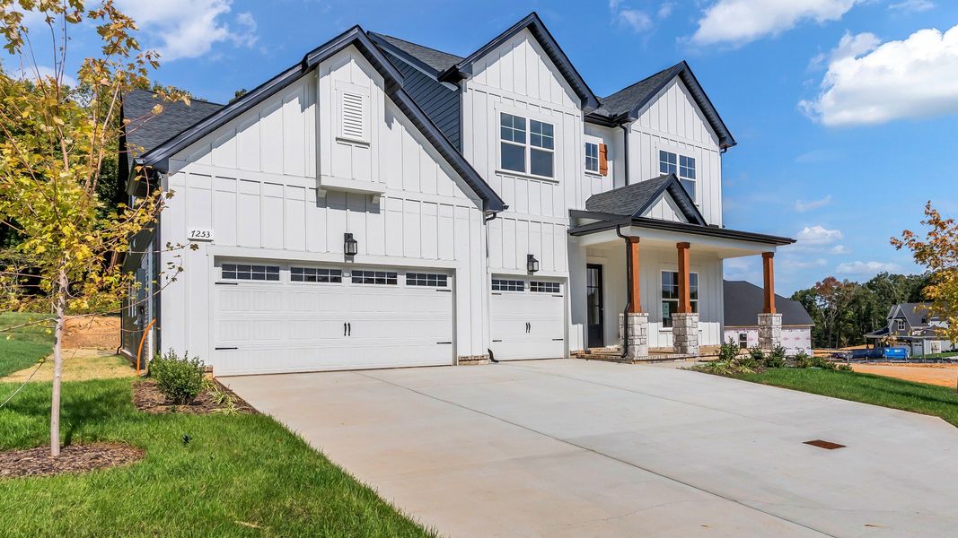 Front exterior of a new home in Brush Creek, Fairview, TN, highlighting curb appeal (Image 22). Front exterior of a new home in Brush Creek, Fairview, TN, highlighting curb appeal (Image 22).