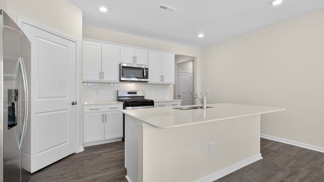 Furnished interior view inside a new home in Honeycutt Oaks, Angier (Image 7). Furnished interior view inside a new home in Honeycutt Oaks, Angier (Image 7).