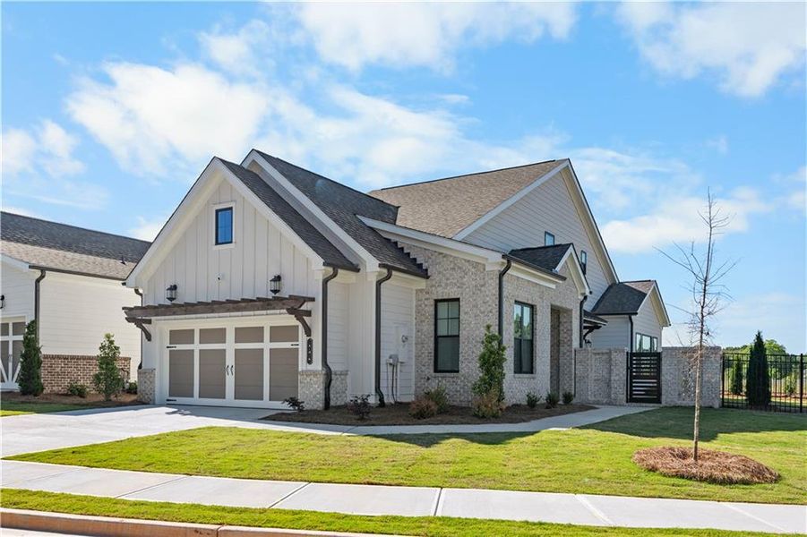 Front exterior of a new home in Aberdeen, Hoschton, GA, highlighting curb appeal (Image 25). Front exterior of a new home in Aberdeen, Hoschton, GA, highlighting curb appeal (Image 25).
