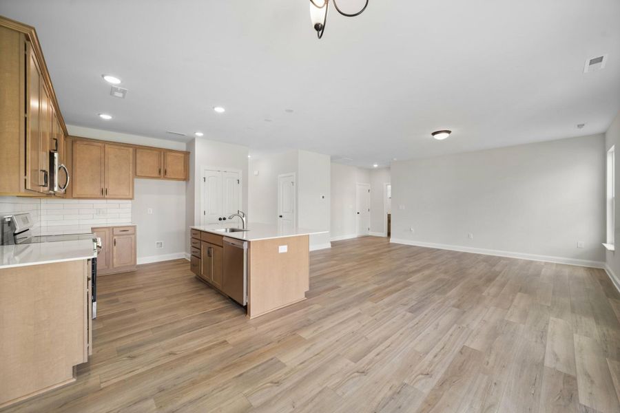 Furnished interior view inside a new home in Cottages at Piper Village, Trinity (Image 9).