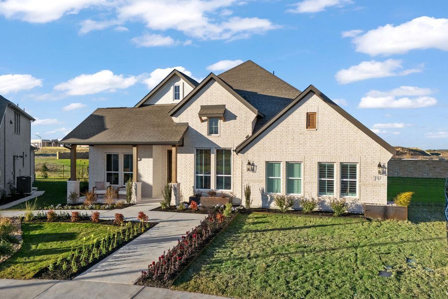 Front exterior of a new home in Parmer Ranch, Georgetown, TX, highlighting curb appeal (Image 1). Front exterior of a new home in Parmer Ranch, Georgetown, TX, highlighting curb appeal (Image 1).
