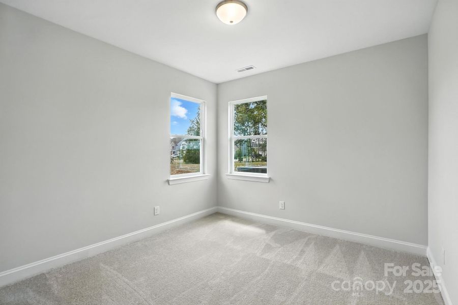 Spacious, unfurnished interior of a new home in Hampton Woods, Charlotte (Image 16).