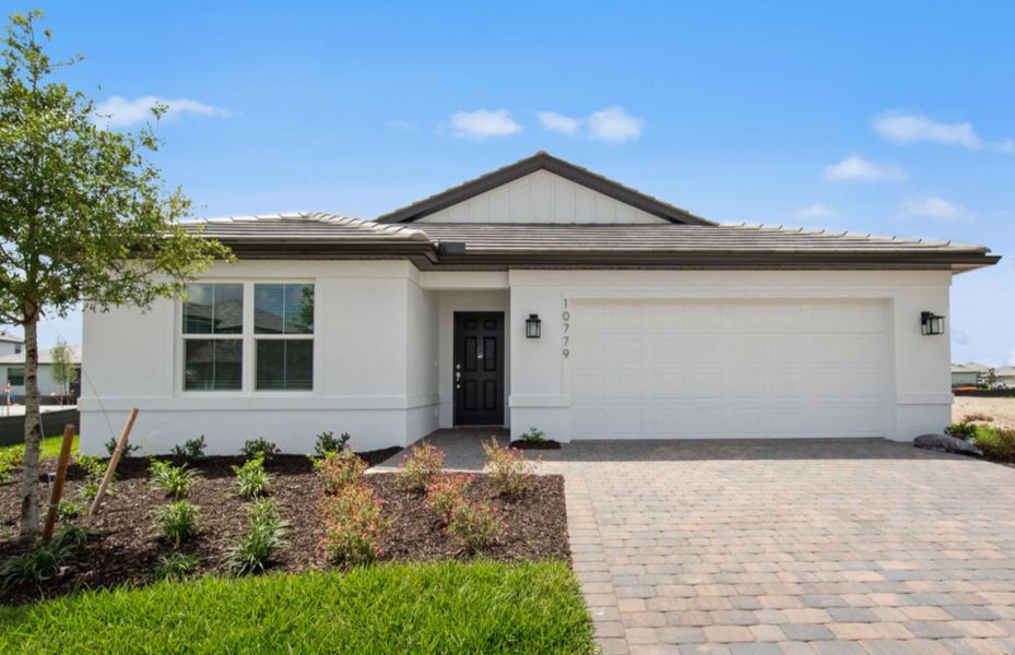 Representative exterior photo of a completed home built from the Chapman by Centex in Caloosa Cove, Labelle, FL (Image 18). Representative exterior photo of a completed home built from the Chapman by Centex in Caloosa Cove, Labelle, FL (Image 18).