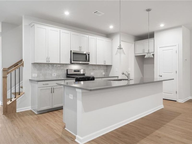 Furnished interior view inside a new home in The Village at Shallowford, Kennesaw (Image 15). Furnished interior view inside a new home in The Village at Shallowford, Kennesaw (Image 15).