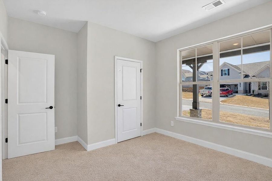 Spacious, unfurnished interior of a new home in Chimney Oaks Overlook, Homer (Image 9).