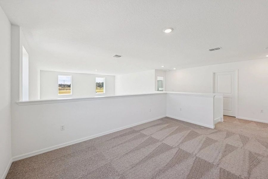 Spacious, unfurnished interior of a new home in Northlake at Ovation, Winter Garden (Image 31).