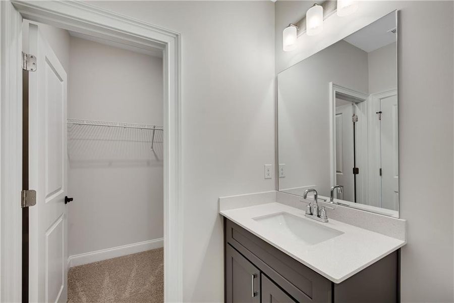 Furnished interior view inside a new home in The Retreat at Caney Creek, Alpharetta (Image 40).