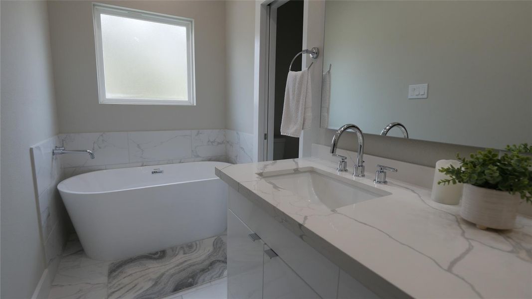 Primary Bath with separate shower with Rainhead faucet and separate soaking tub Primary Bath with separate shower with Rainhead faucet and separate soaking tub