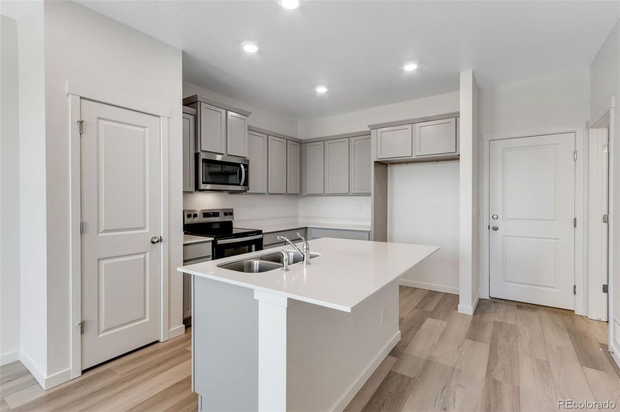 Furnished interior view inside a new home in Vista Meadows, Fort Lupton (Image 3).