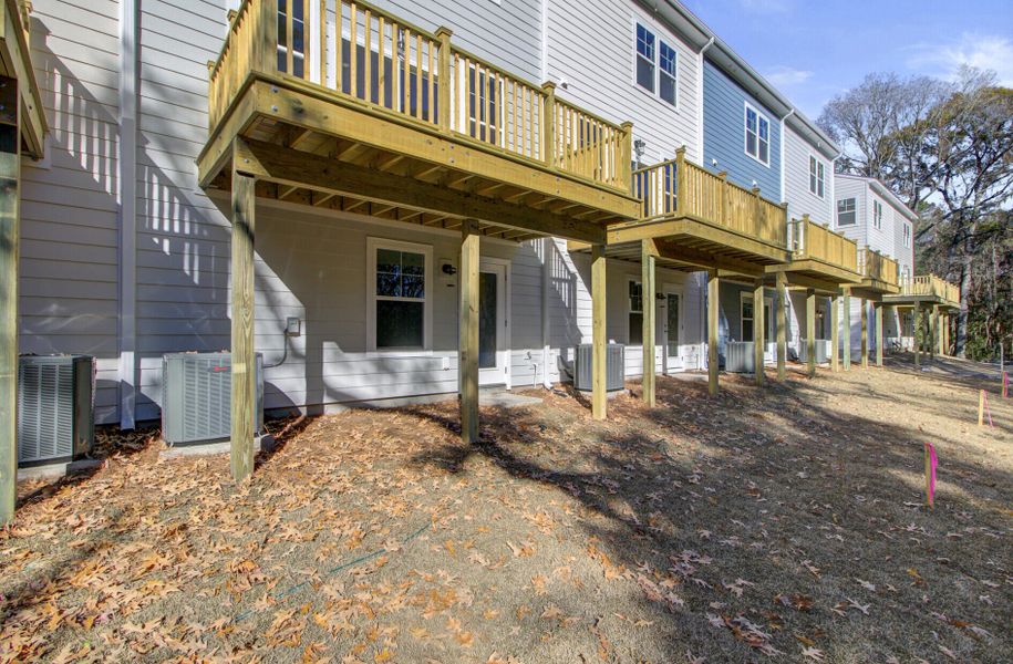 Exterior details and patio area of a home in , Johns Island (Image 21).