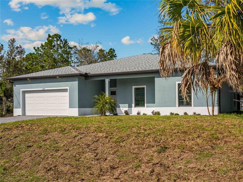 Exterior details and patio area of a home in , North Port (Image 29).