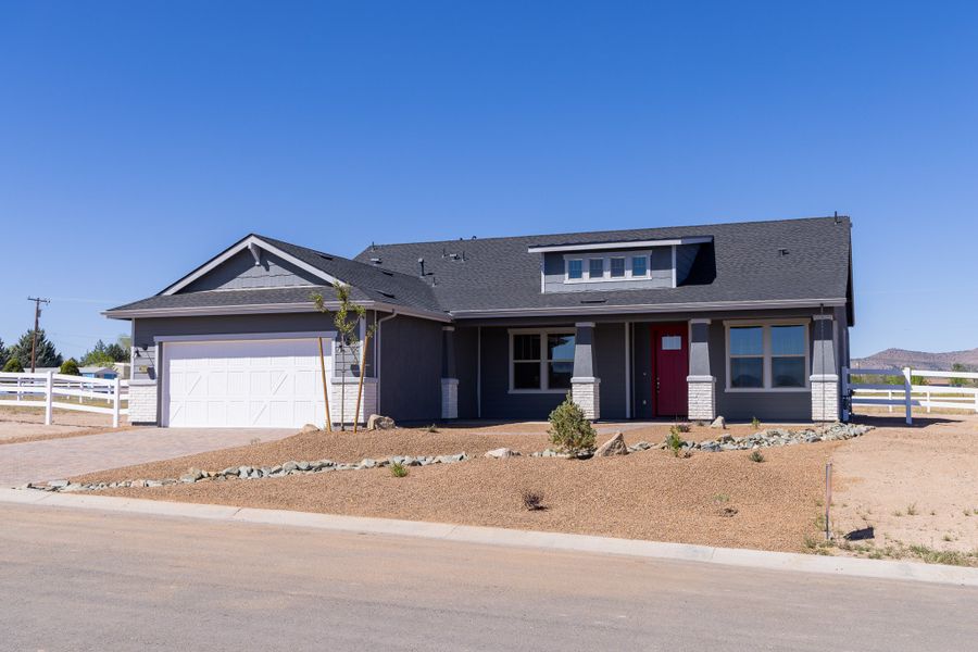 Front exterior of a new home in Heritage Pointe, Chino Valley, AZ, highlighting curb appeal (Image 2).
