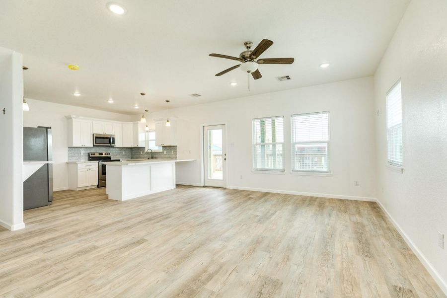 off the entrance and open to the kitchen