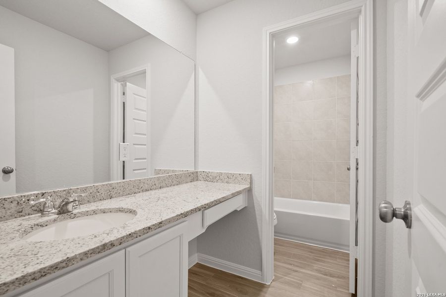 Furnished interior view inside a new home in Hunters Ranch, San Antonio (Image 6).