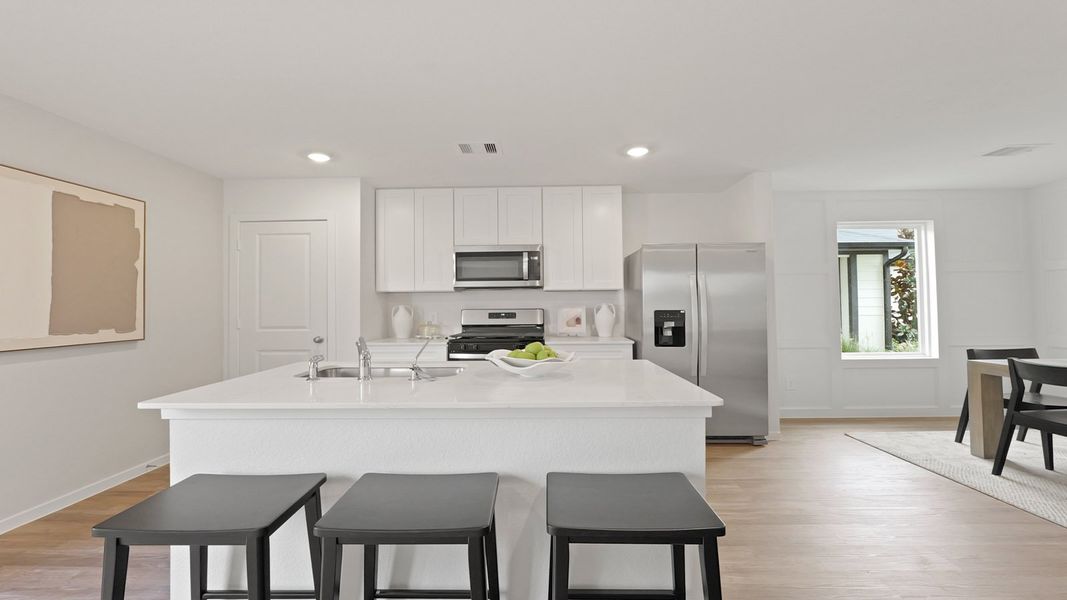 Representative furnished interior of a home built from the Franklin by D.R. Horton in Silverthorne, Conroe (Image 10).
