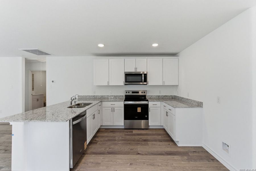 Furnished interior view inside a new home in Horizon Ridge, San Antonio (Image 6).
