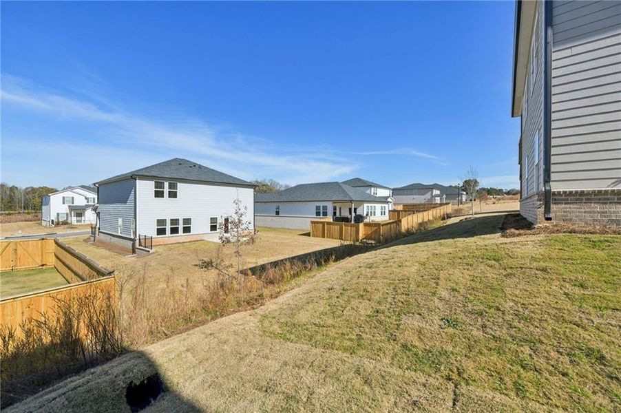 Exterior details and patio area of a home in Preserve at Mountain Creek, Pendergrass (Image 4).