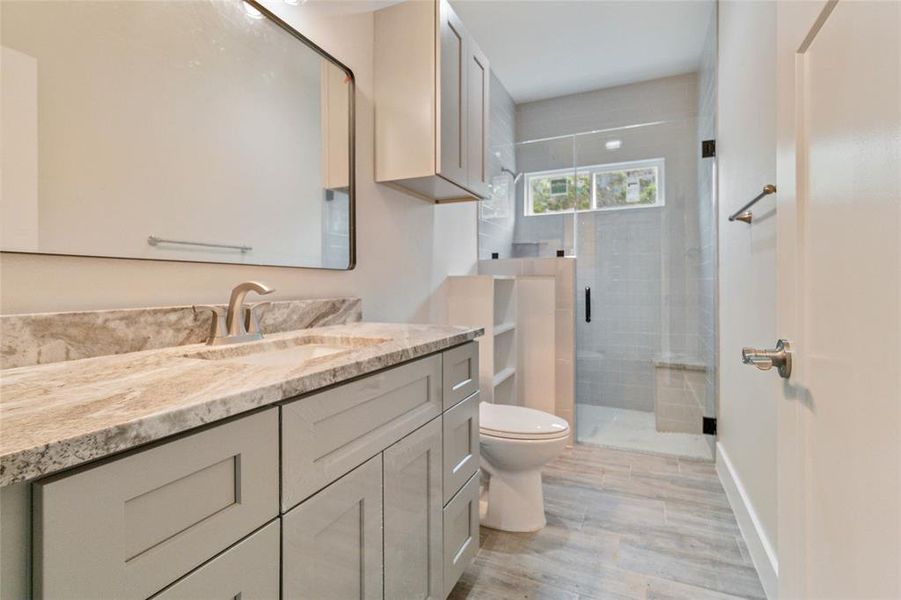 Full bathroom with walk-in shower