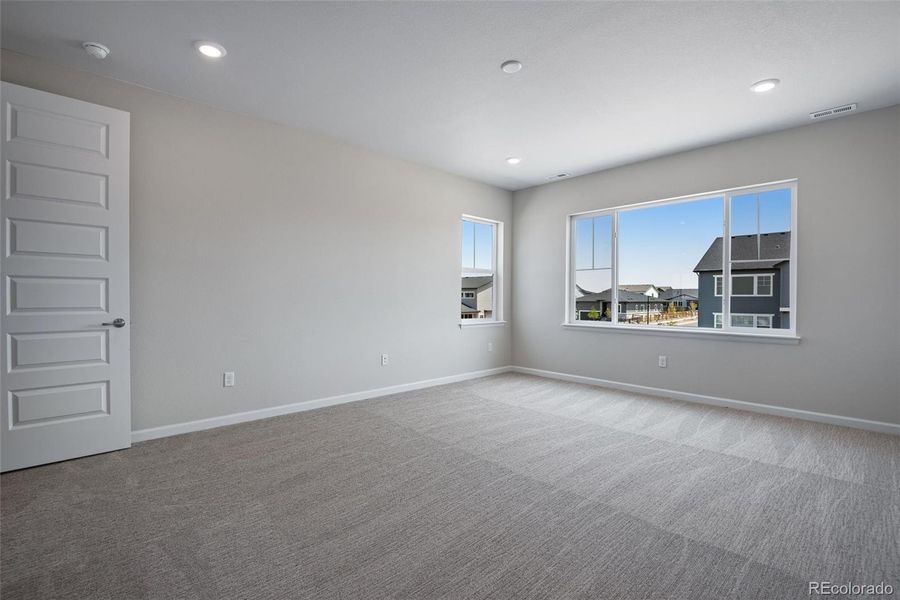 Spacious, unfurnished interior of a new home in Ensemble at The Aurora Highlands, Aurora (Image 29).