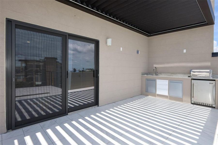 Exterior details and patio area of a home in , Ormond Beach (Image 23).