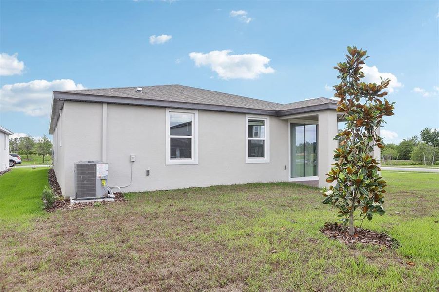 Exterior details and patio area of a home in Springs at Lake Alfred - Signature Series, Lake Alfred (Image 25).