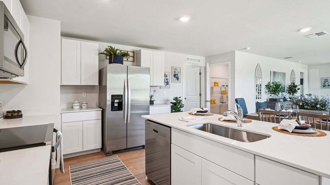 Furnished interior view inside a new home in Coral Bay - Express & Tradition, North Fort Myers (Image 15).