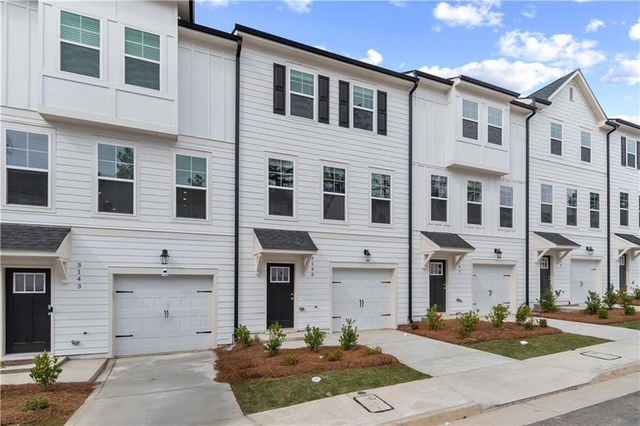 Front exterior of a new home in Monticello, Atlanta, GA, highlighting curb appeal (Image 2). Front exterior of a new home in Monticello, Atlanta, GA, highlighting curb appeal (Image 2).