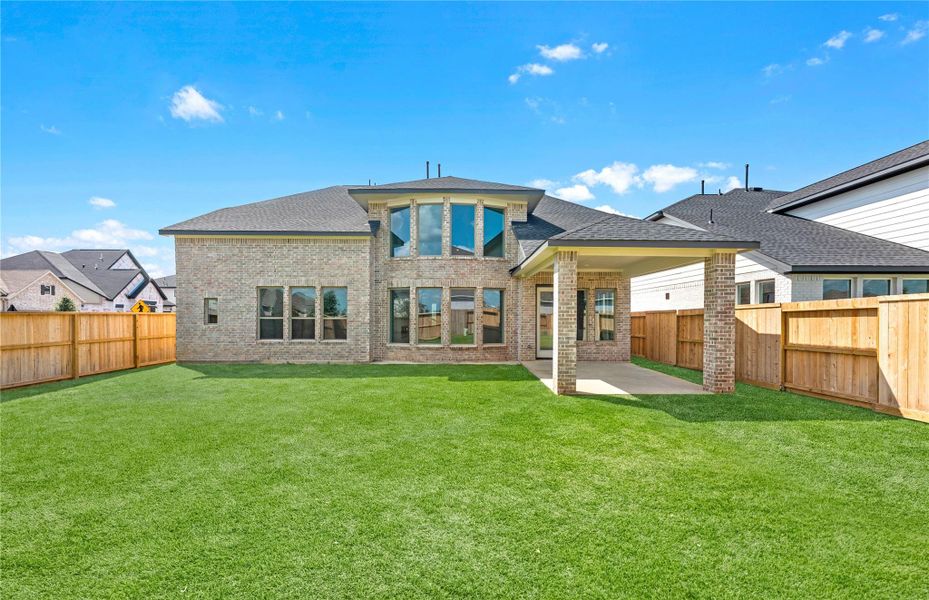 Exterior details and patio area of a home in Jordan Ranch – 60', Brookshire (Image 2). Exterior details and patio area of a home in Jordan Ranch – 60', Brookshire (Image 2).