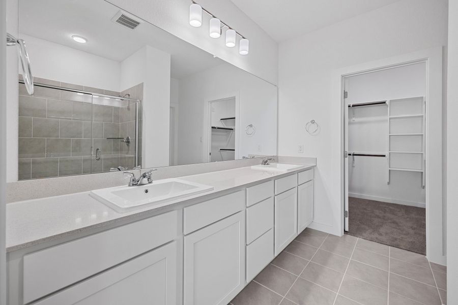 Primary Bath in the Mesquite home plan by Trophy Signature Homes – REPRESENTATIVE PHOTO Primary Bath in the Mesquite home plan by Trophy Signature Homes – REPRESENTATIVE PHOTO