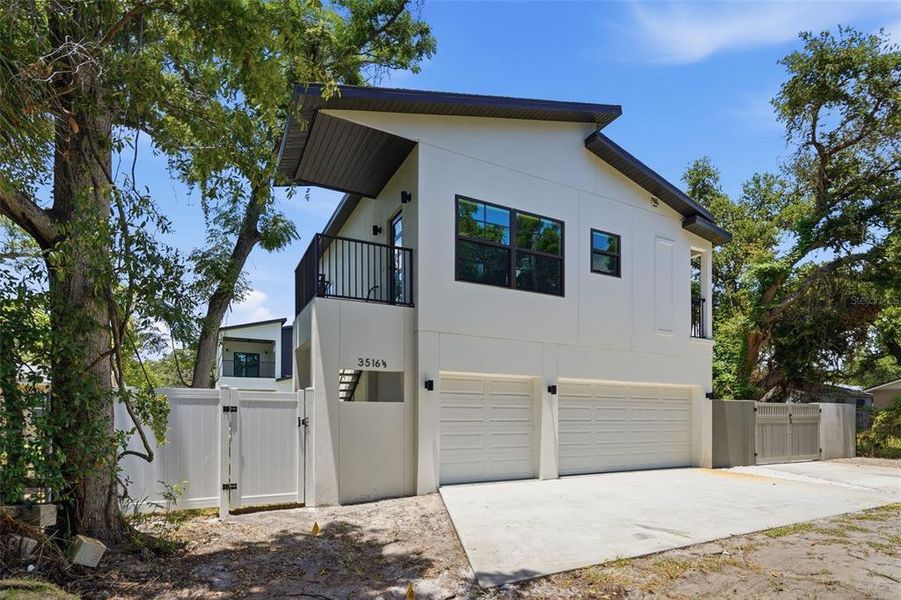 Front exterior of a new home in , St. Petersburg, FL, highlighting curb appeal (Image 33). Front exterior of a new home in , St. Petersburg, FL, highlighting curb appeal (Image 33).
