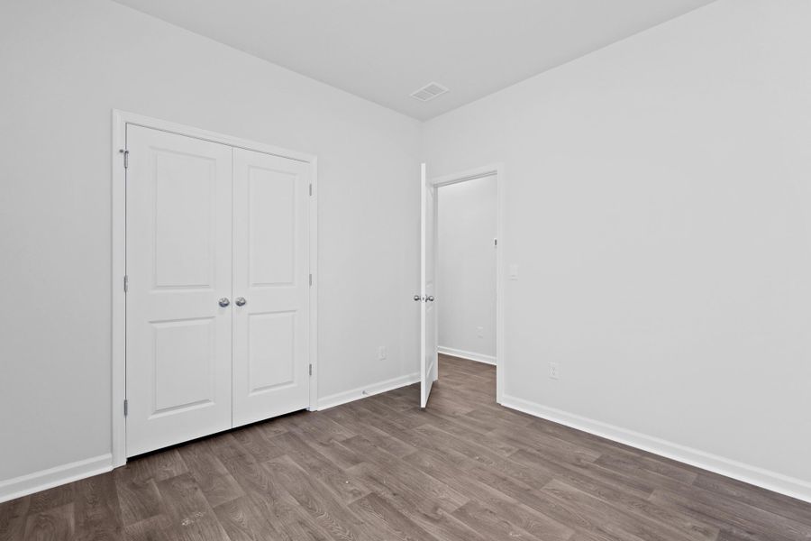 Spacious, unfurnished interior of a new home in Pine Hills at Cane Bay, Summerville (Image 25).