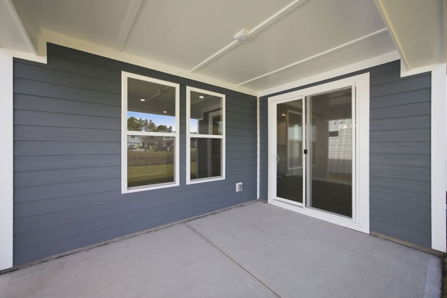 Exterior details and patio area of a home in Terrapin, Leland (Image 4).