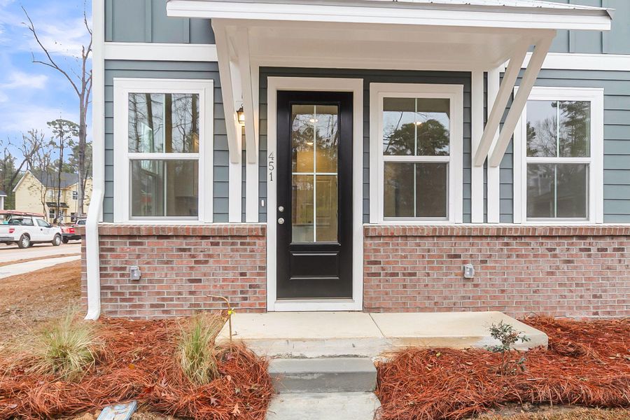Exterior details and patio area of a home in Windward Village, Summerville (Image 3). Exterior details and patio area of a home in Windward Village, Summerville (Image 3).