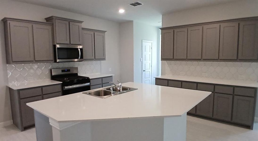 Kitchen - All Home and community information, including pricing, included features, terms, availability and amenities, are subject to change at any time without notice or obligation. All Drawings, pictures, photographs, video, square footages, floor plans, elevations, features, colors and sizes are approximate for illustration purposes only and will vary from the homes as built.