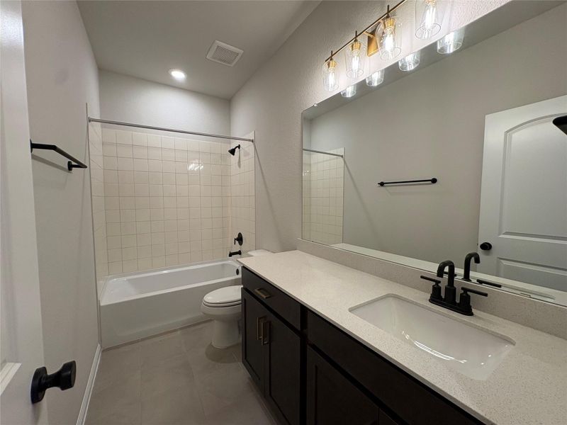 Furnished interior view inside a new home in Willow Springs, Buda (Image 7).