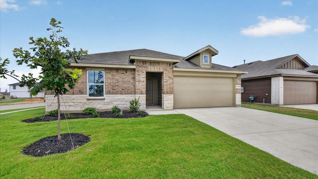 Representative exterior photo of a completed home built from the Bailey by D.R. Horton in Sunnycreek, Crowley, TX (Image 19).