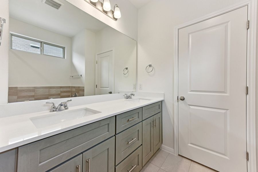 Furnished interior view inside a new home in Sage Hollow, Kyle (Image 9).