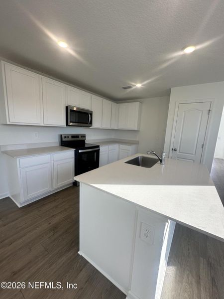 Furnished interior view inside a new home in Rookery, Green Cove Springs (Image 6).