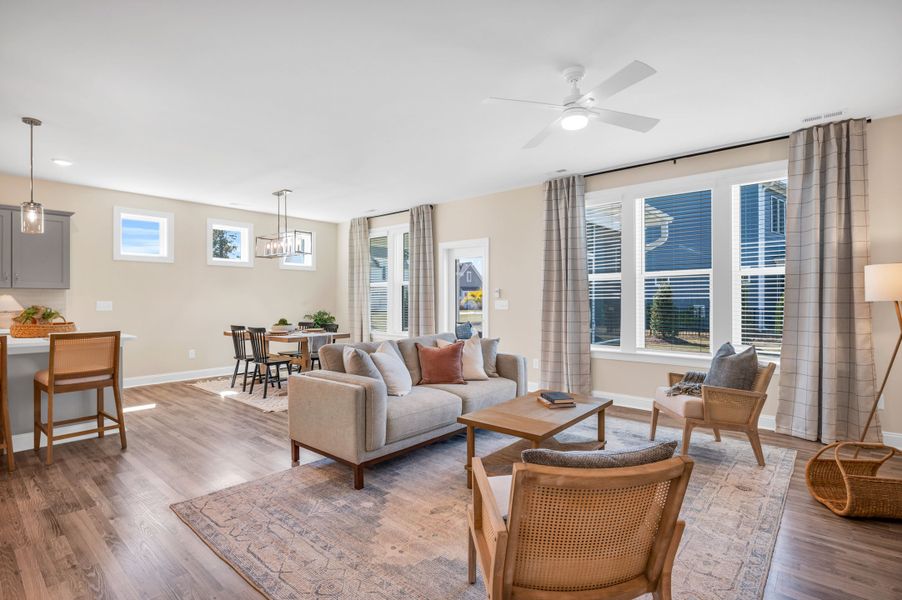 Representative furnished interior of a home built from the The Amherst by RobuckHomes in Windwater, Hampstead (Image 44).